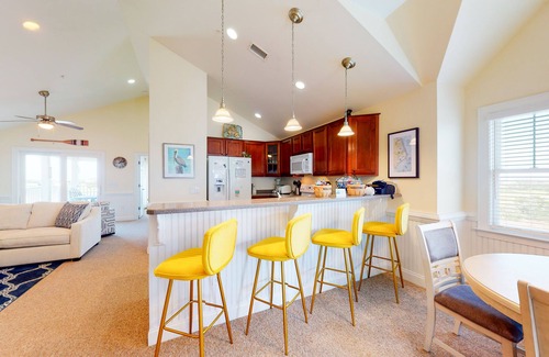Hatteras Condo | Waterfront condo with private washer/dryer, pool, water views, and free WiFi