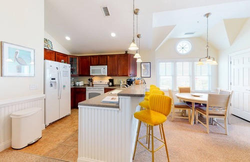 Hatteras Condo | Waterfront condo with private washer/dryer, pool, water views, and free WiFi