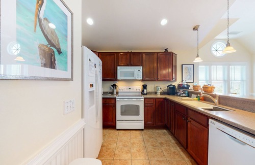 Hatteras Condo | Waterfront condo with private washer/dryer, pool, water views, and free WiFi