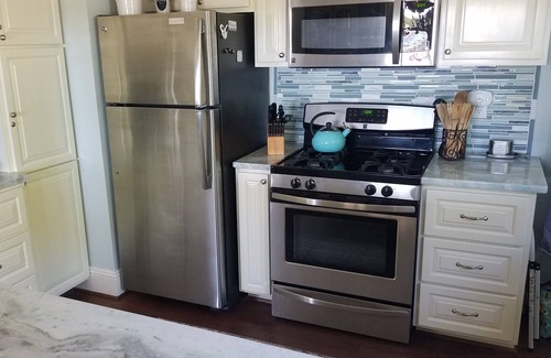 Morehead City House | Waterfront Cottage on Taylor's Creek w/Boat Dock - Near Shops and Restaurants