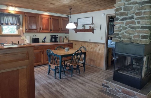 Swengel Cabin | Waterfront cottage on corner lot w/ hot tub, fire pit, & kayaks. Pet friendly.