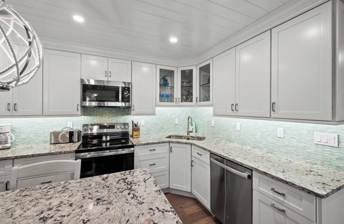 Sanibel Condo | Waterfront Dock View 2 bedroom, 2 bath at Sanibel Moorings Resort #1641