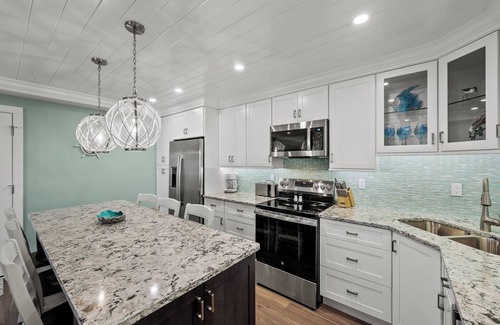 Sanibel Condo | Waterfront Dock View 2 bedroom, 2 bath at Sanibel Moorings Resort #1641