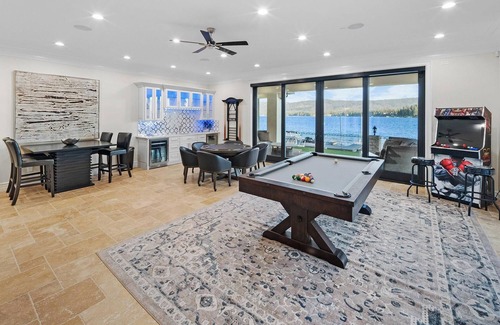 Fawnskin Cabin | Waterfront Dreams: Luxurious Lakefront! Incredible Views! 5 Masters! A/C! Extravagant Outdoor Living! Hot Tub! Pool Table and more!