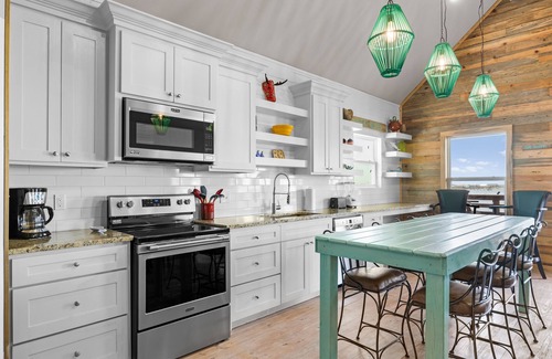 Flour Bluff House | Waterfront Escape w/Views | Shared Pool & Boat Dock | Orange Crush by AvantStay