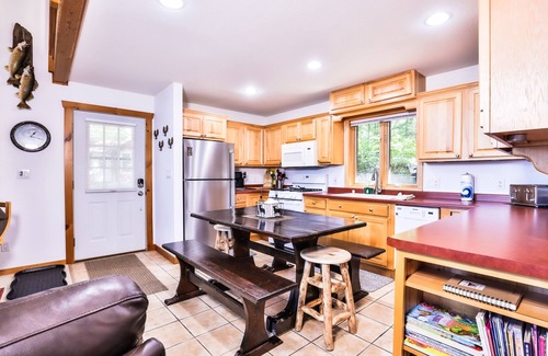 Eagle River Cottage | Waterfront getaway with wood fireplace, dock, & lakeside deck