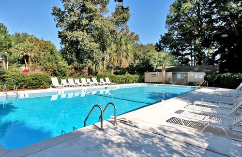 Night Heron House | Waterfront getaway in heart of Sea Pines - short walk to beach & steps to pool