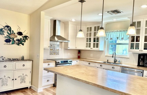 Palm City House | Waterfront heated pool home,dock,close beaches,world class sail fishing & golf!!