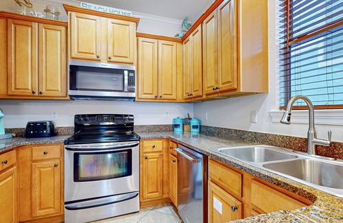 Villages of Crystal Beach House | Waterfront home near the beach with lagoon-style pool & lanais - dog-friendly