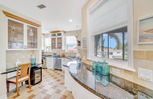 Matlacha House | Waterfront home with private pool, dock, patio, balconies, & bikes