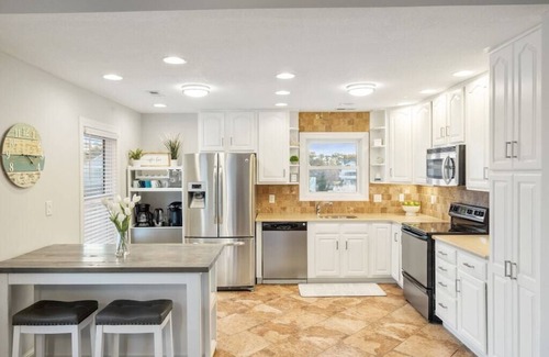 Colington Harbour House | Waterfront! Hot Tub, Game Room, Theater Room, Fire Pit, Kayaks, SUPs,YMCA,DogsOK