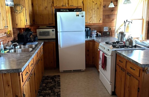 Drummond House | Waterfront Log Home & Bunkhouse, 300' Scott's Bay, Boat Access w Dock & Hunting,
