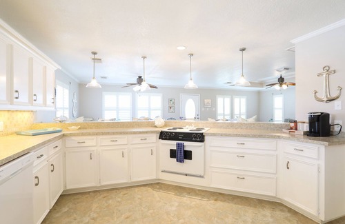Crystal Beach House | Waterfront oasis with furnished lanai, outdoor kitchen & dock - great location