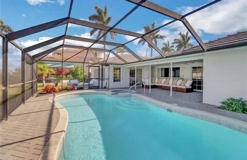 Coquina Sands House | Waterfront paradise minutes from the beach & downtown Naples!