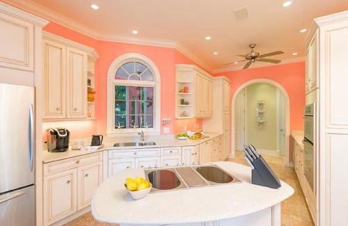 Captiva House | Waterfront Pink House with Private Dock & Pool