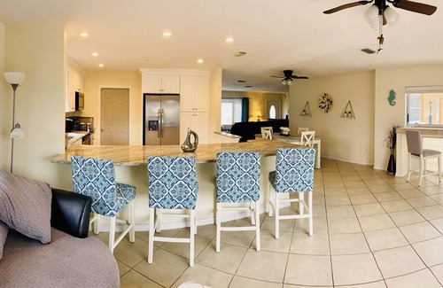 Broadmoor House | Waterfront Pool home very close to golf and beaches