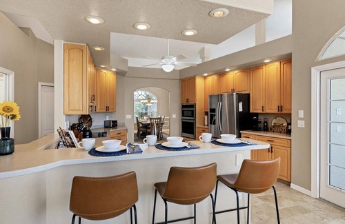 Punta Gorda House | Waterfront Punta Gorda Isles 3 Bedroom pool hot tub, dock, bikes office