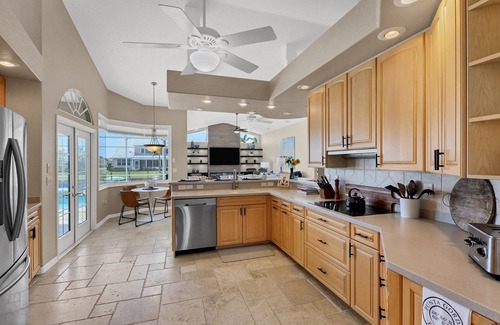 Punta Gorda House | Waterfront Punta Gorda Isles 3 Bedroom pool hot tub, dock, bikes office