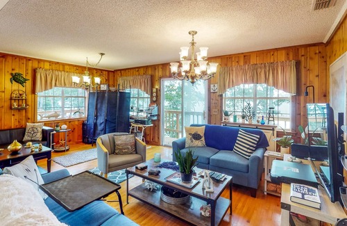 Fort Gaines House | Waterfront stay with boat launch, private beach, wrap-around deck, & grill