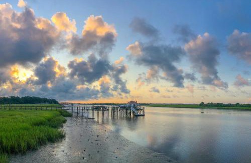 Sea Trail House | Waterfront Sunset Beach Escape with Golf View