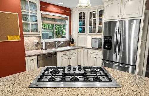 Livingston House | Waterfront w/room to gather & beautiful lake views! Lakeside firepit w/swings