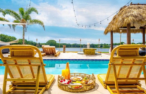 Florida North Atlantic Coast Villa | Waterfront w/Beach Htd Pool Cinema Game Room Tiki