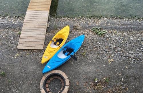 Geneva House | Waters Edge Lakefront with Kayaks Fire Pit and Dock