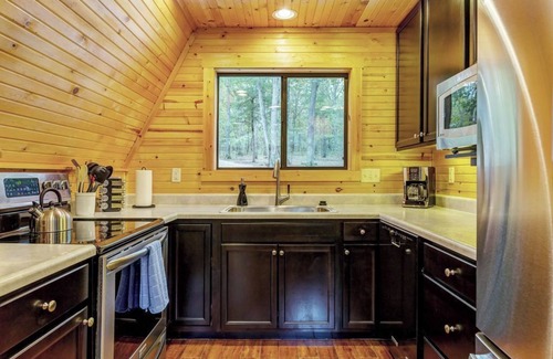 Wright City Cottage | Waterside Cottage w/Hot Tub by StayLage