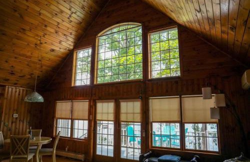 Geneva House | Waterside Leisure Lakefront Hot Tub & Game Room