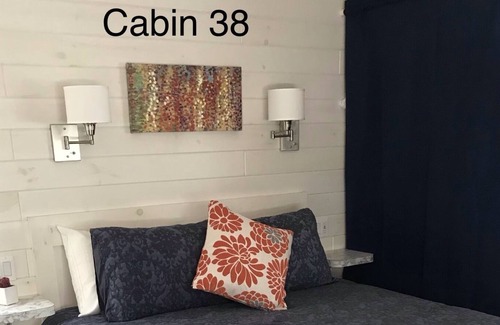 Steele Creek House | Waterview Studio Cabin With Private Porch #19 at Long Cove Resort by Redawning