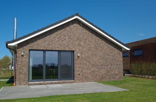 Sehestedt House | Watt´n Blick - Hundefreundliches Ferienhaus mit Ausblick über die Wiesen bis zum Deich