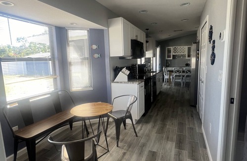 Englewood South House | Welcome to the haven 5 miles from the beach with hot tub.