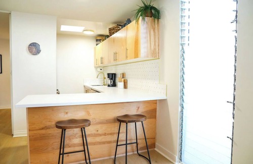 Mission Hills Apartment | Welcome to The Hillside Hideaway! This unique rental offers two separate units, perfect for two families or couples vacationing together who want their own private space. Step inside to discover a one-of-a-kind blend of mid-century retro-chic.