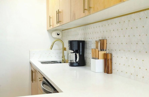 Mission Hills Apartment | Welcome to The Hillside Hideaway! This unique rental offers two separate units, perfect for two families or couples vacationing together who want their own private space. Step inside to discover a one-of-a-kind blend of mid-century retro-chic.