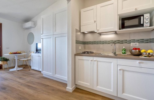 Olbia Apartment | Welcomely - Terrazza Romantica sul Mare di Olbia