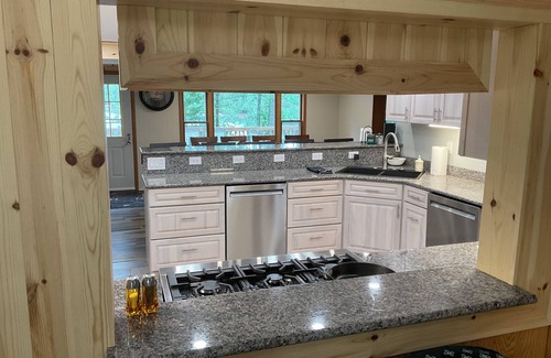 Lewiston House | Welcoming lake house with five bedrooms and a huge deck on Tee lake in Lewiston.