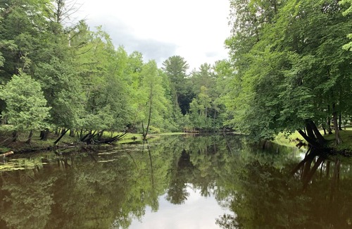 Menominee House | Well-appointed River home w/pool, screened porch, freestanding tub