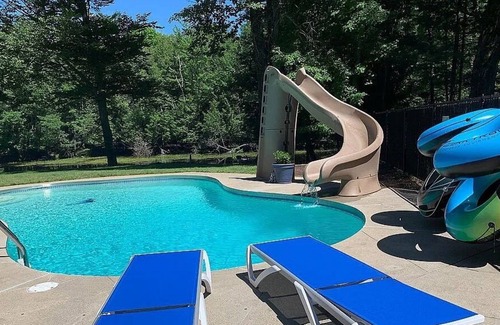 Menominee House | Well-appointed River home w/pool, screened porch, freestanding tub