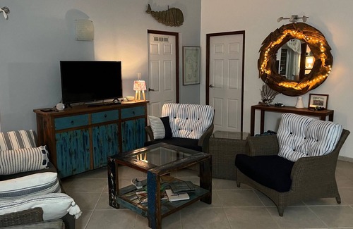 Hato Villa | Well furnished, 1 story open floor plan villa with veranda and adjacent to pool.