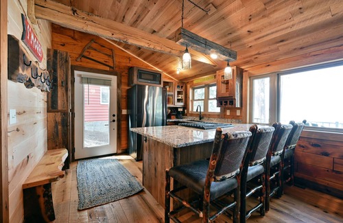 Spooner Cabin | Western exposure with sand frontage