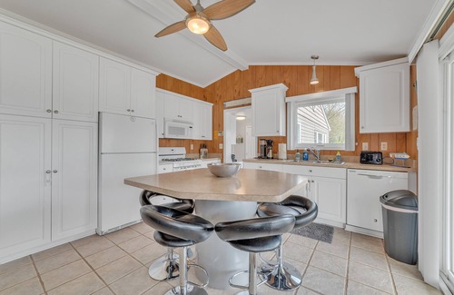 Harrison House | Wet Feet Retreat: Endless Summer Fun – Sandy Beaches, Swimming, and Kayaking!