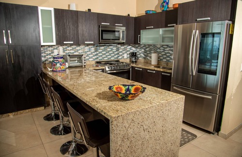 La Cruz de Huanacaxtle Condo | Whale Watching from our Large Oceanfront Condo on the Beach