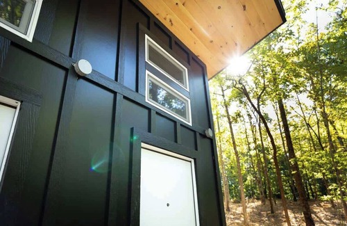 Zoe RV Rental | Whippoorwill's Nest - Glamping Tent with AC