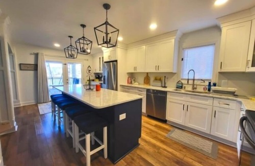 North Shore House | Wifi, hot tub, pool table, air hockey, and fully loaded boat house!. This is Lake Lxury!