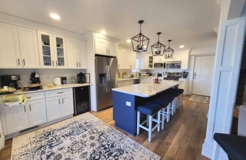 North Shore House | Wifi, hot tub, pool table, air hockey, and fully loaded boat house!. This is Lake Lxury!