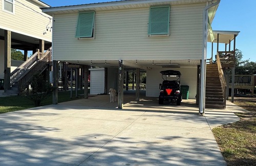 Shoreline Park House | Wine’d Down-Charming 2 BR/2BA on the water with a pool & dock in Bay St Louis