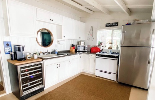 Laconia House | Winnipesaukee waterfront family compound with 40 foot dock and amazing sunsets!