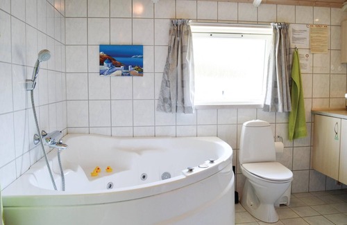 Skibby House | Within walking distance of the fjord is this large, spacious vacation home with plenty of room for t