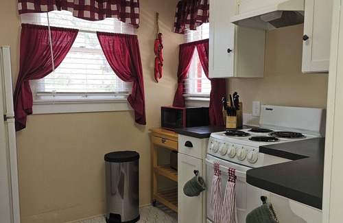 Sam Hughes Apartment | Within walking distance to the U of A and a variety of excellent dining options.