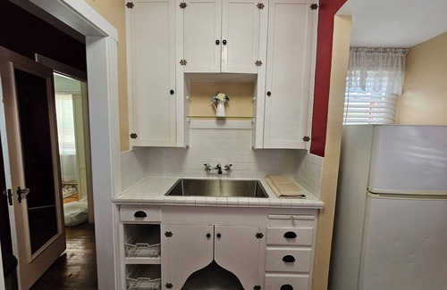 Sam Hughes Apartment | Within walking distance to the U of A and a variety of excellent dining options.